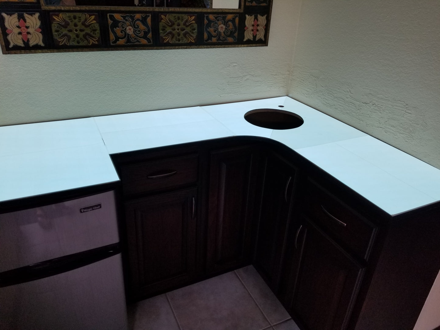 Light Tape is manufactured to specification with hole for sink