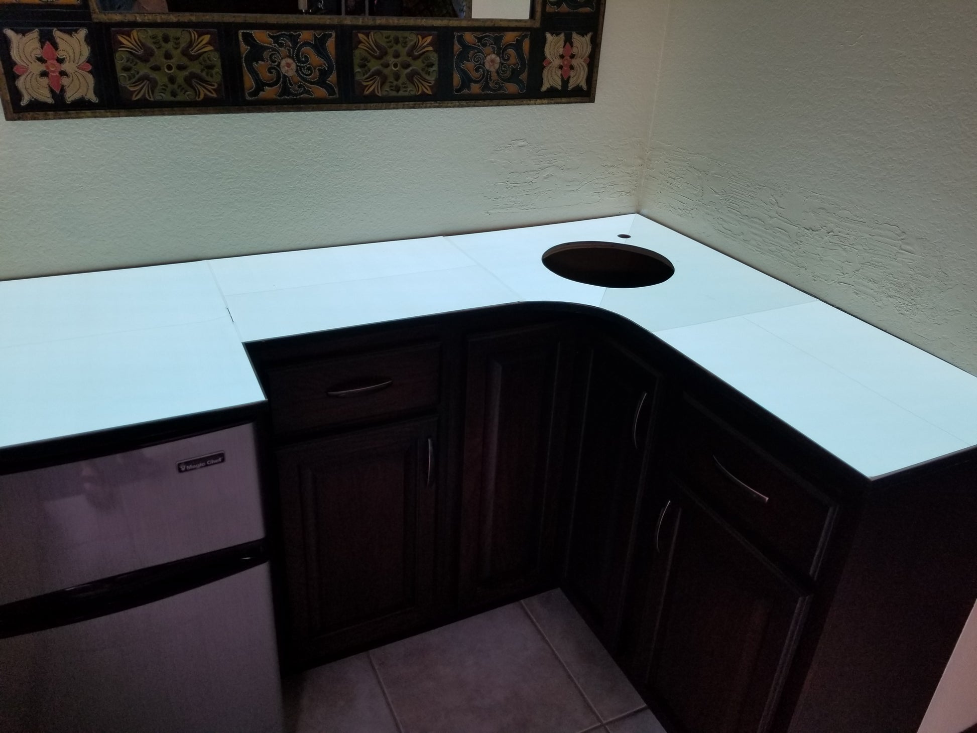 Light Tape is manufactured to specification with hole for sink